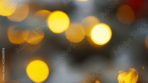 Gold Christmas lights bokeh background blurry glowing garland spots macro abstract texture for winter holiday celebration template stock photo