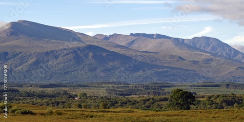 Vast mountain landscape with wooded hills and clear skies, Highlands, Ben Nevis, Scotland, Great Britain