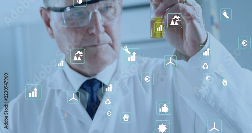 Inspecting glass vial, senior scientist in white lab coat, goggles, tie at lab with AR overlays