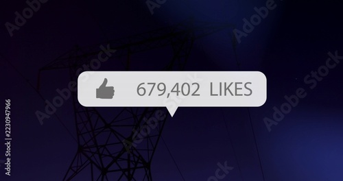 Floating likes bubble hovering over night sky near power pylon, with thumbs-up and 679,402 likes