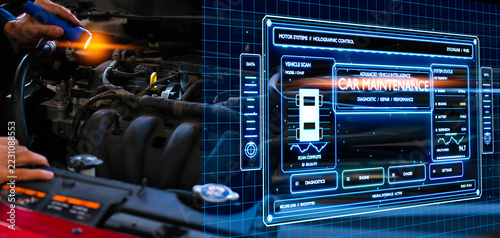 Mechanic examining futuristic 3D car hologram interface for maintenance diagnosis