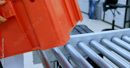 Hand of scientist holding container working in blood laboratory with copy space