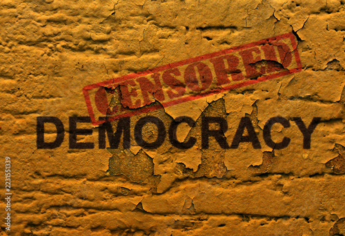 Censored Democracy Concept with Red Stamp on Textured Background
