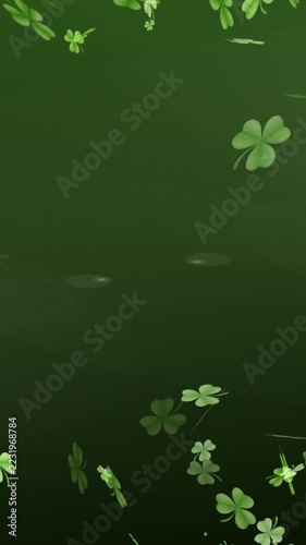 Vertical video: Spawning at top, clovers drifting and rotating down, forming seamless green loop