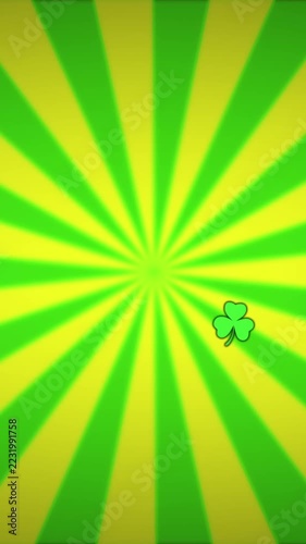 Vertical video: Edge spawning clovers drifting along arcs across radial burst, creating loop decor