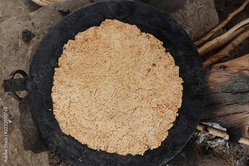 Canvas Print Pakistan's Traditional wheat Bread or Chapati making on tawa, Photo