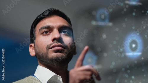 Cinematic Close Up of Man Interacting with Futuristic Holographic Interface
