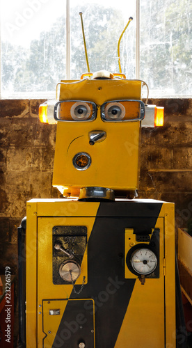 Robot made from industrial boxes with gauges and antennae