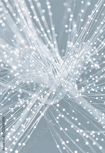 Abstract background with glowing fiber optic cables and digital data transmission glowing in soft light