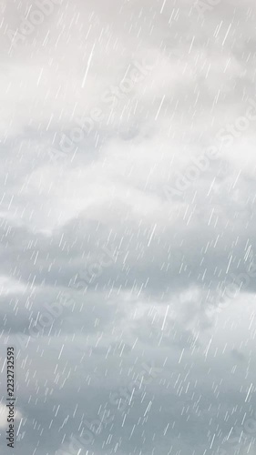 Vertical video: Overcast sky releasing steady diagonal rain as vapor condensing, camera fixed