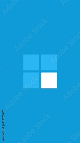 Vertical video: On load centered 2x2 tiles cycling corner highlights and pulsing as loader