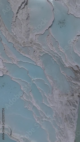 Aerial view of breathtaking natural site of white travertine thermal terraces, Pamukkale, Türkiye	
