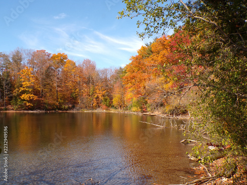 Fall landscape with colorful trees and lake