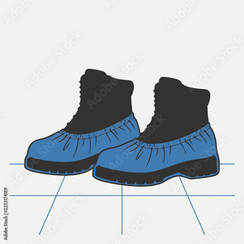 Pair of blue and black hiking boots on a white background