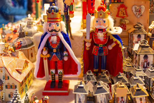 Colorful wooden nutcracker figurines displayed at a Christmas market in Salzburg, Austria.