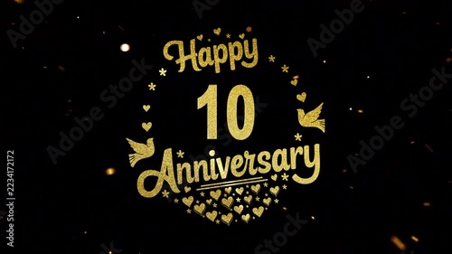 happy ten year anniversary gold text with particle gold, heart, bird in black background. 10th year anniversary celebration