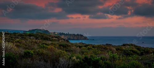 Dramatic vibrant sunset scenery in Crystal Cove SP, California