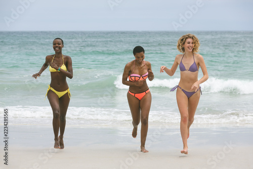 Women with bikini enjoying on beach