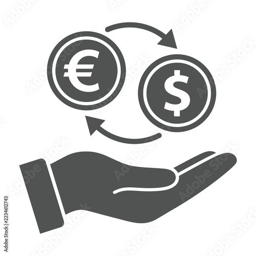 Hand exchanging euro and dollar coins currency exchange concept