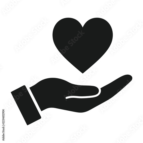 Hand holding heart symbol love care support kindness charity help