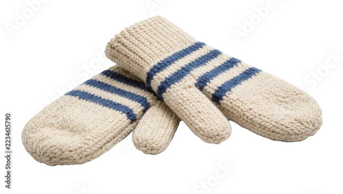 Obraz na plátně Beige knitted wool mittens with blue stripes for winter cold weather