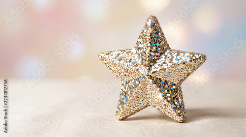 Gold Glitter Star Decoration With Blurred Lights Background