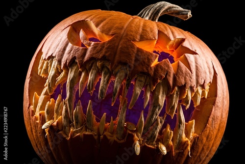 Eerie Halloween Pumpkin Carving with Sharp Teeth