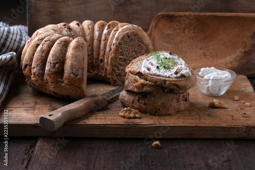Mixed wheat spelt nut bread with vegan cream cheese substitute