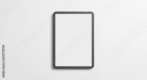 A clean photorealistic modern tablet computer mockup with a blank screen centered on a solid white background with soft studio lighting.