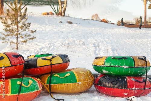 Tubing rental in a city park on sunny winter day