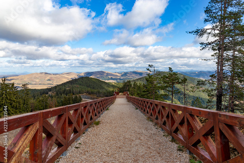 Obraz na plátně Wooden observation deck with panoramic autumn mountain view near Zlatibor, Serbi