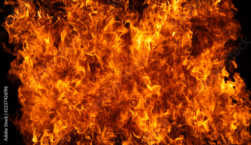 Obraz na plátně Fire burns behind flame